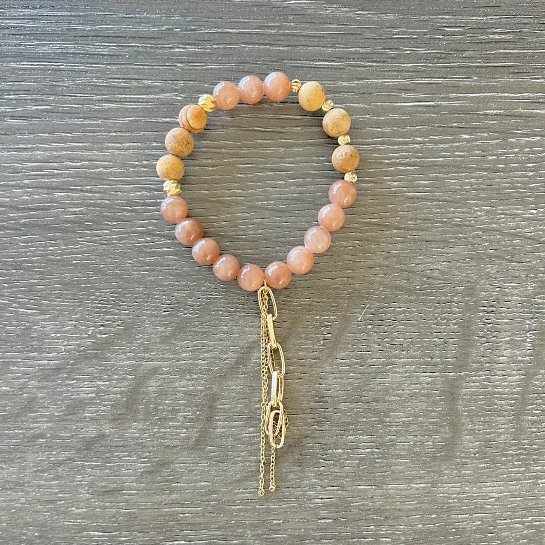 Tan and gold bracelet