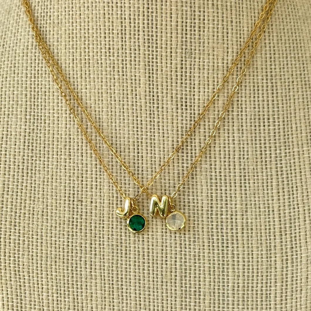 Small balloon initial with birthstone necklace.