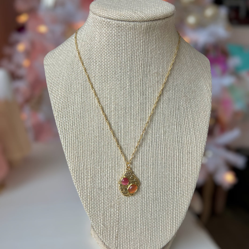 Gold filled necklace with abstract charm.