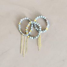 Load image into Gallery viewer, Grey Bracelet Stack with Chain Fringe.
