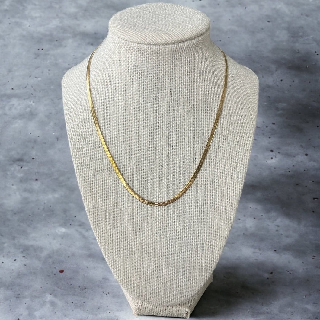 Herringbone Chain Necklace In Gold Plated Stainless Steel.