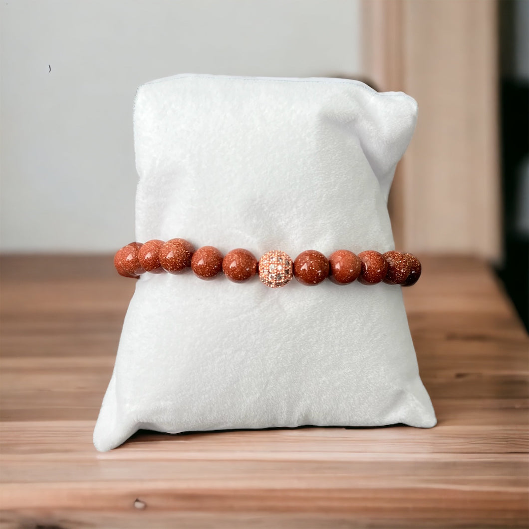 Goldstone 8mm Bracelet with Rose Gold Pave Stone Accent Bead